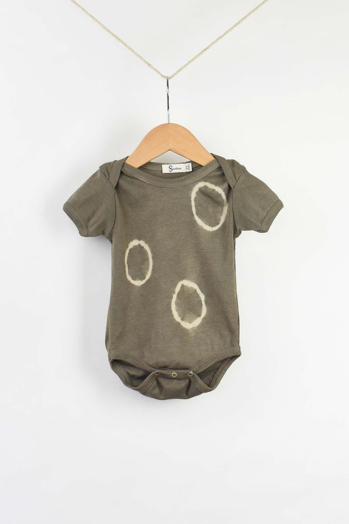 organic cotton onesie dyed with plants, naturally dyed with weld leaves