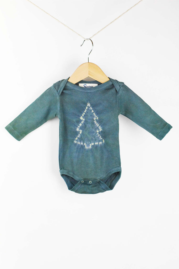 naturally plant-dyed organic cotton kid's clothing, baby long sleeve onesie dyed with indigo and weld leaves and flowers